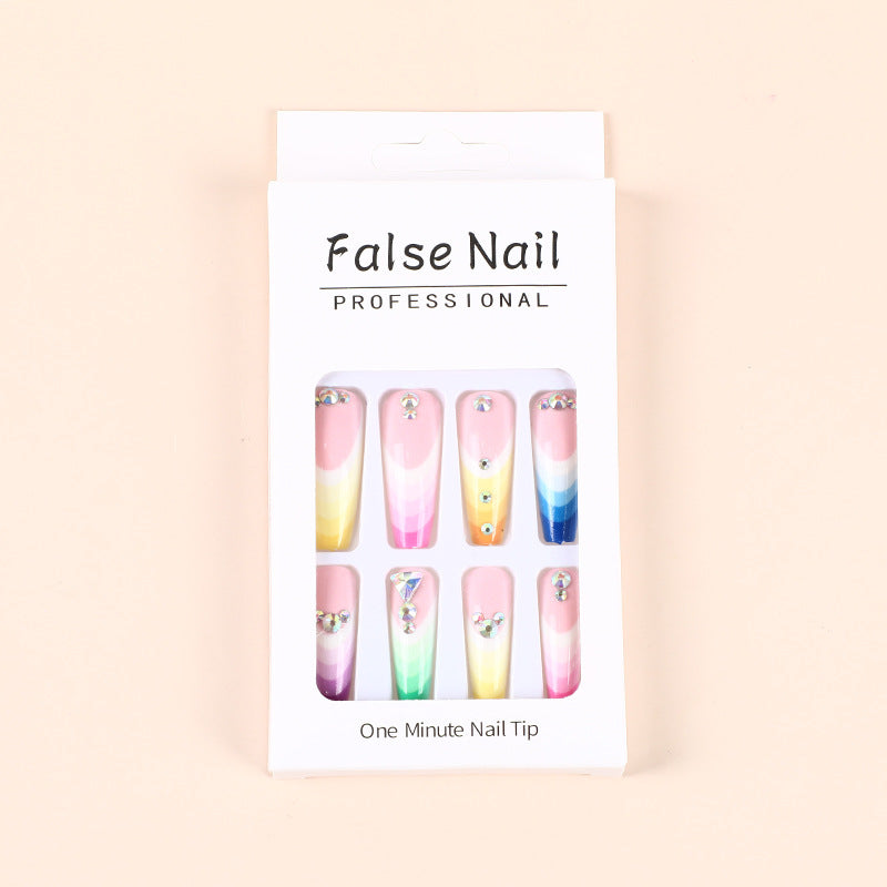 Artificial nails in luxurious ombre design with rhinestone accents Kalsten