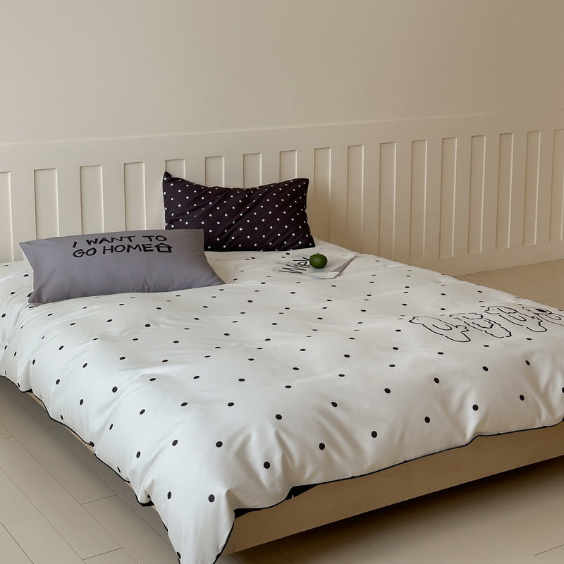 Reversible bedding set made of cotton blend with polka dot pattern and minimalist animal illustration