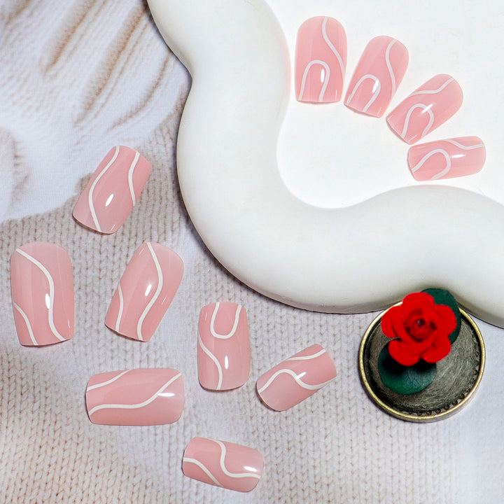 Elegant Press-On Nail Design with Artistic White Swirl Kalsten
