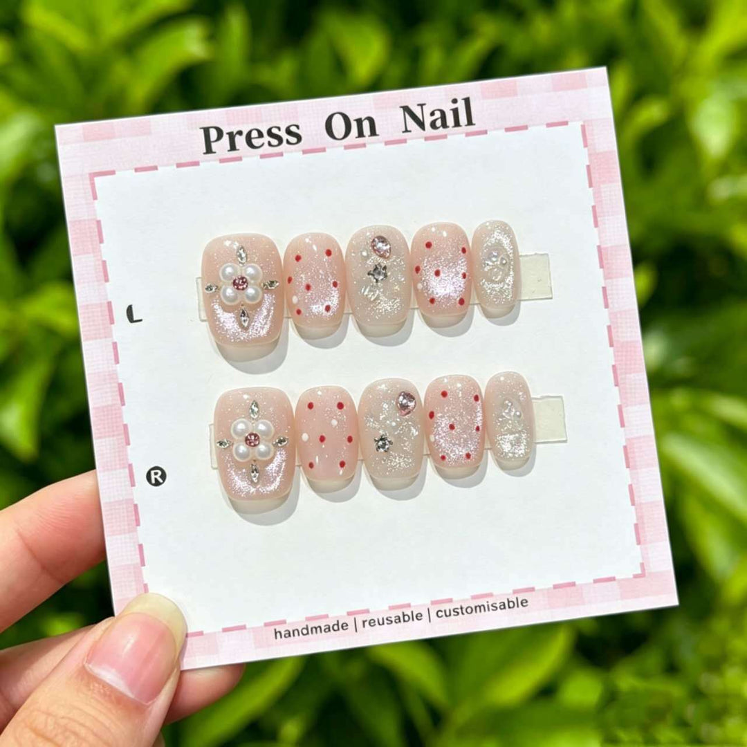 Artistic Press-On Nail Set with Floral and Graphic Designs