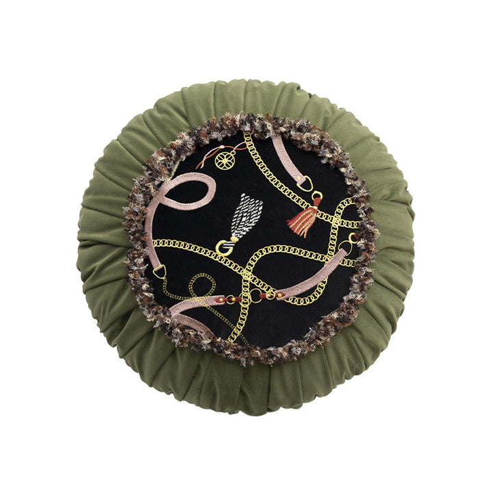 Round decorative cushion with pleated hem and embroidered central panel