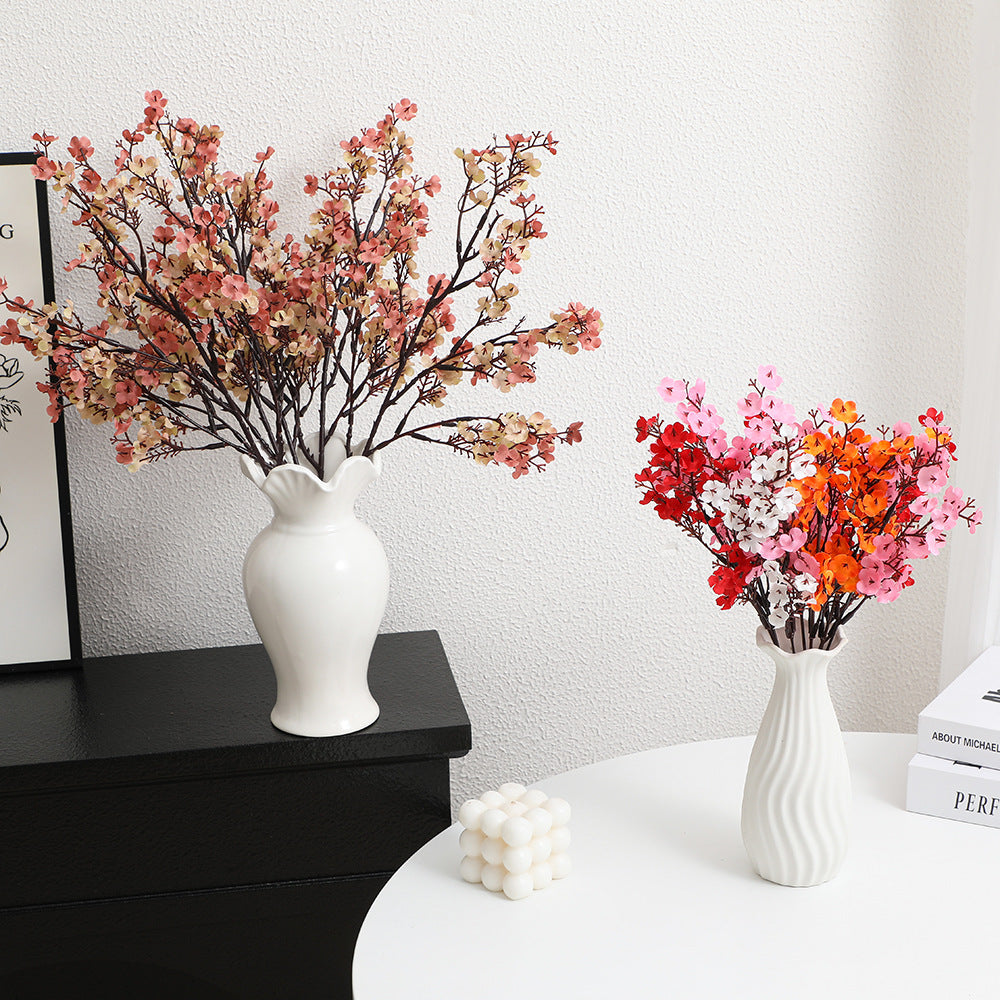 Decorative artificial flower branch