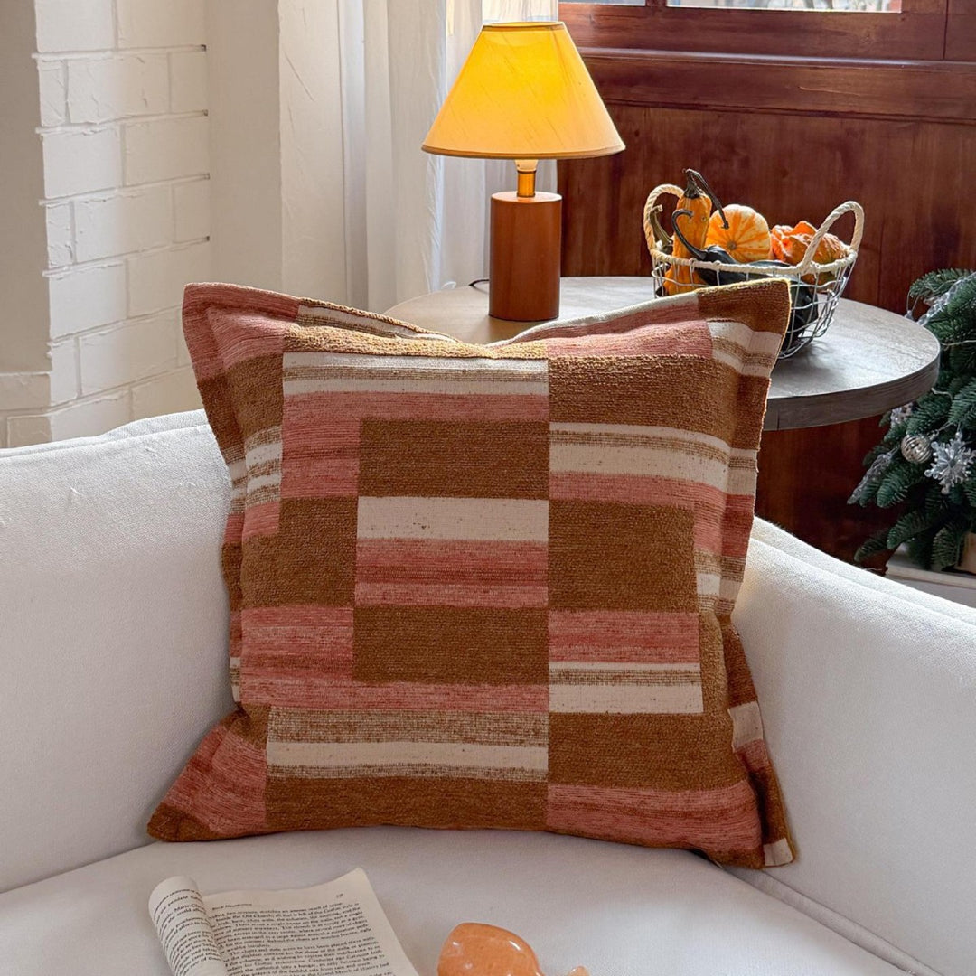 Decorative cushion made of linen look with hand-tied fringes and cross-stitch detail