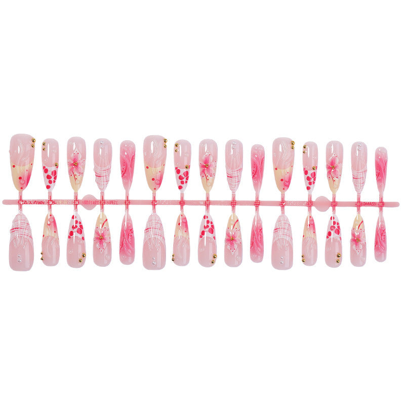 Creative art nail set with floral and glittering accents Kalsten