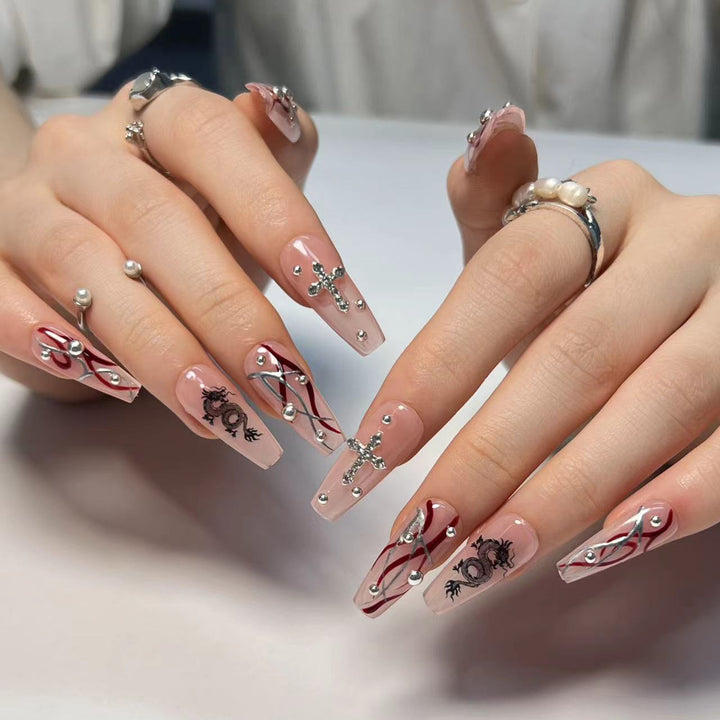 Artistic Artificial Nail Extensions with Glitter and Flower Accents Kalsten