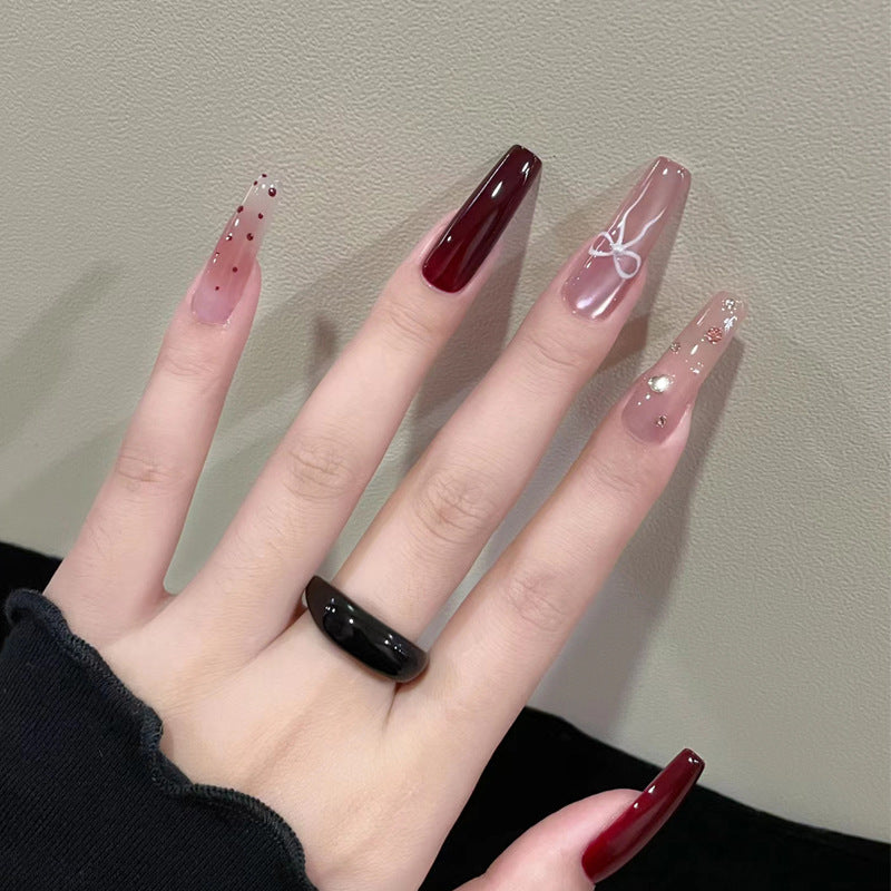 Artistic Long Press-On Nails Set with Glossy and Decorative Accents Kalsten