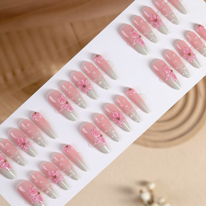 Artificial nail set with delicate flowers and glitter accents Kalsten