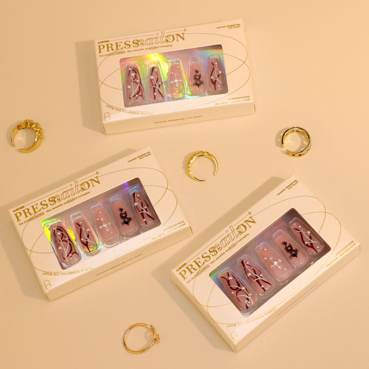 Artistic Artificial Nail Extensions with Glitter and Flower Accents Kalsten