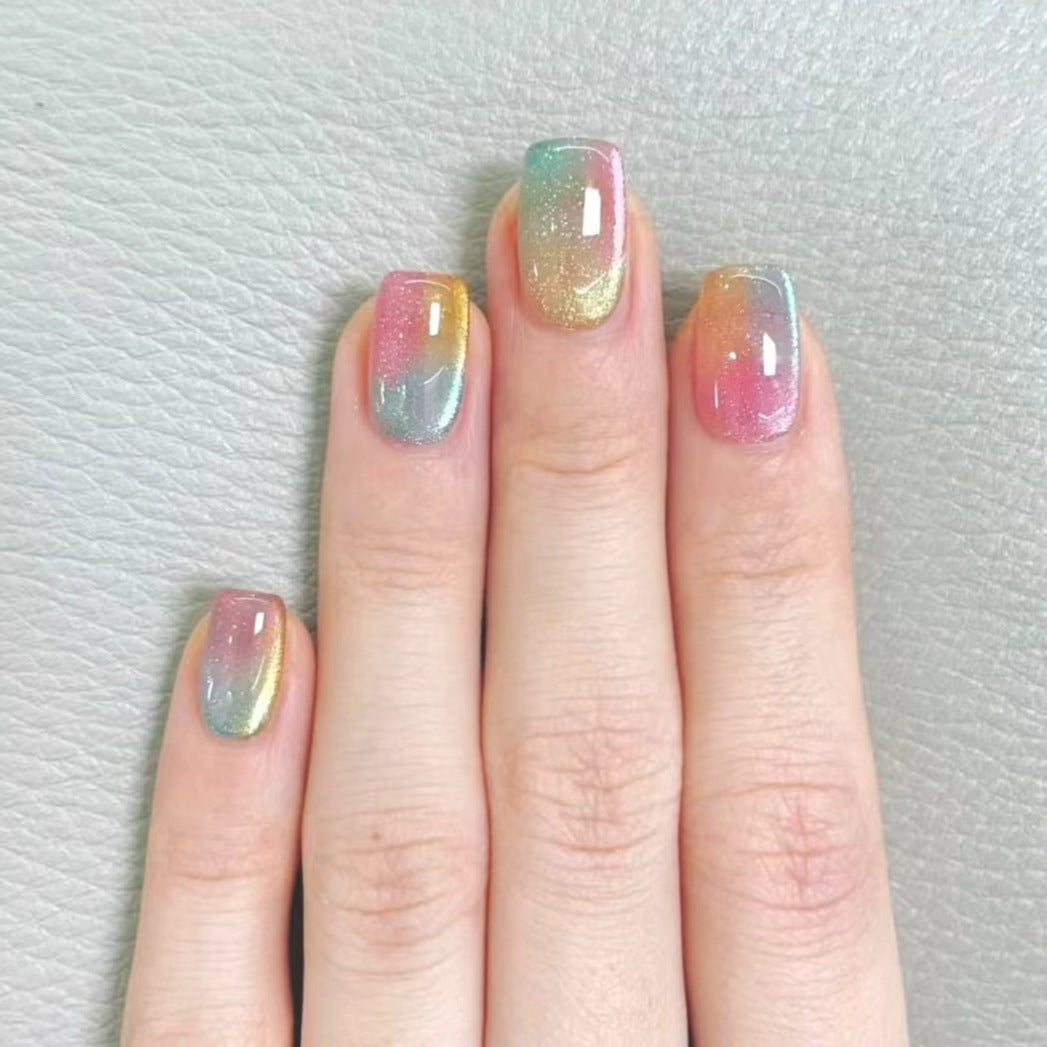 Artificial nails in delicate ombre design with glitter effects Kalsten