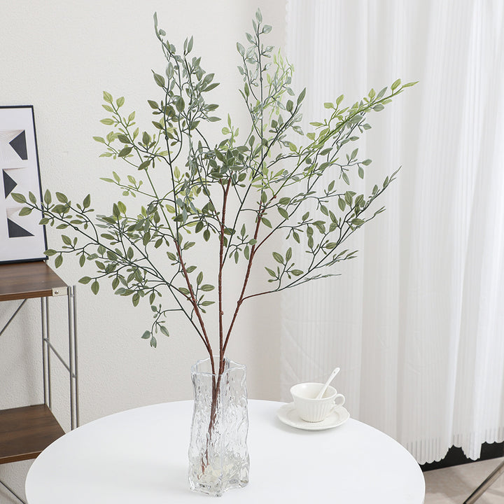 Decorative artificial branch with filigree, curved twigs