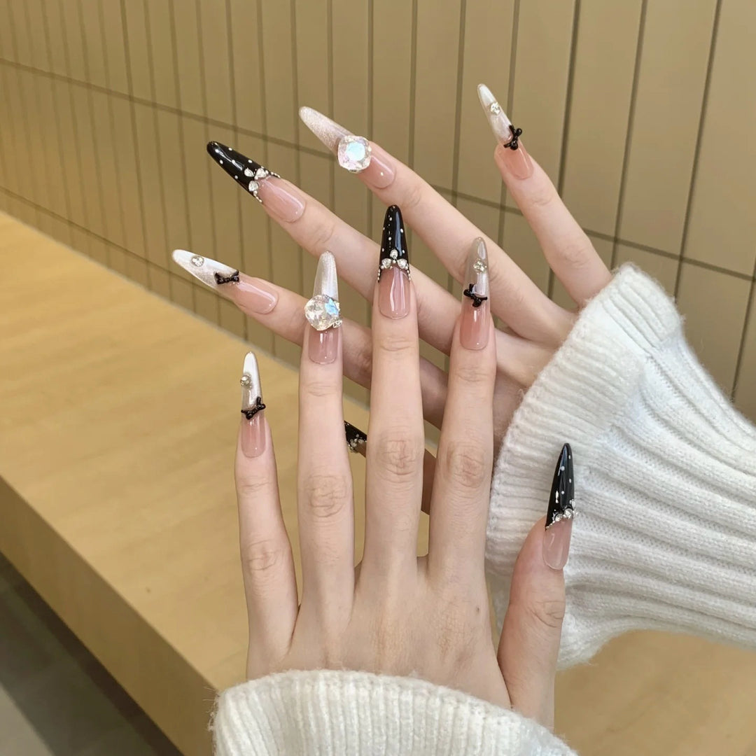 Stylish glitter accent artificial nails with elegant detailing Kalsten