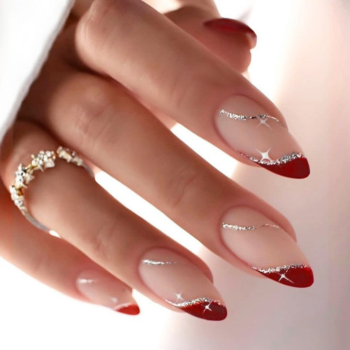 Artificial nail creation with glamorous tips and glitter details Kalsten