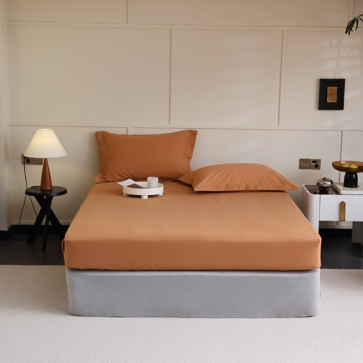 Fitted sheet made of cotton jersey with extra deep hem and elastic all-around rubber