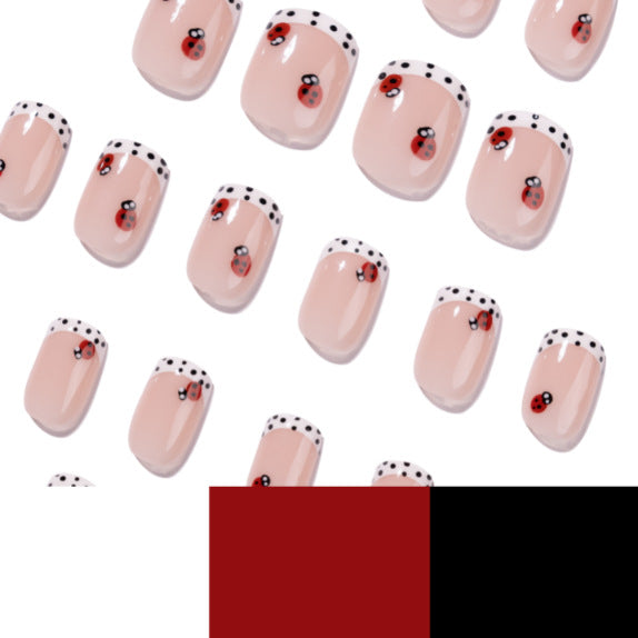 Artistic nail art with ladybug designs Kalsten