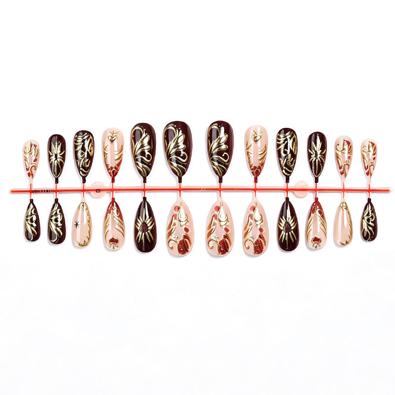 Decorative Press-On Nail Art Set with Intricate Gold Floral Design kalsten