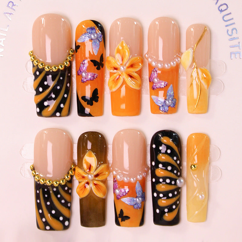 Artificial nail set with elegant flower and butterfly designs Kalsten