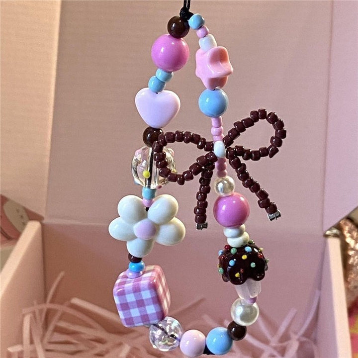 Playful Beaded Charm Phone Strap Kalsten