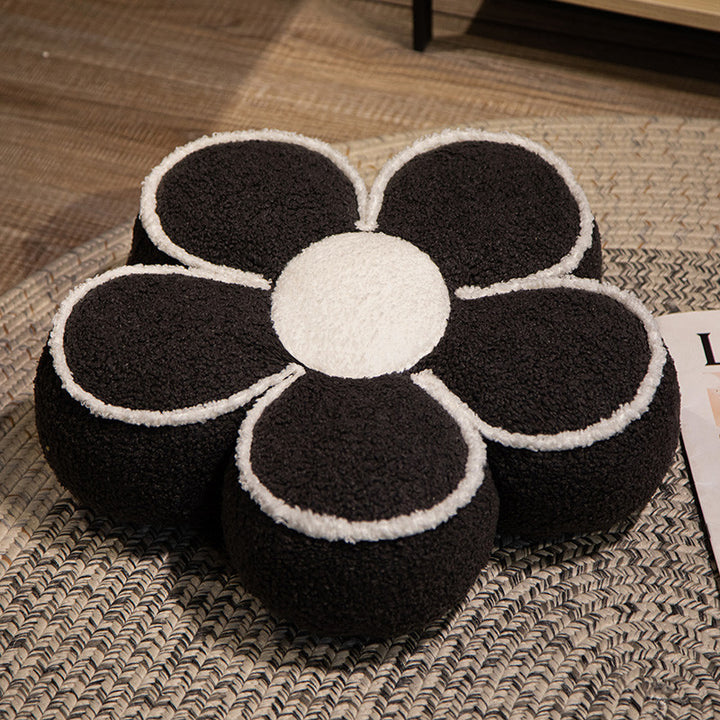 Padded seat cushion in flower shape with faux leather center piece and fluffy edge padding