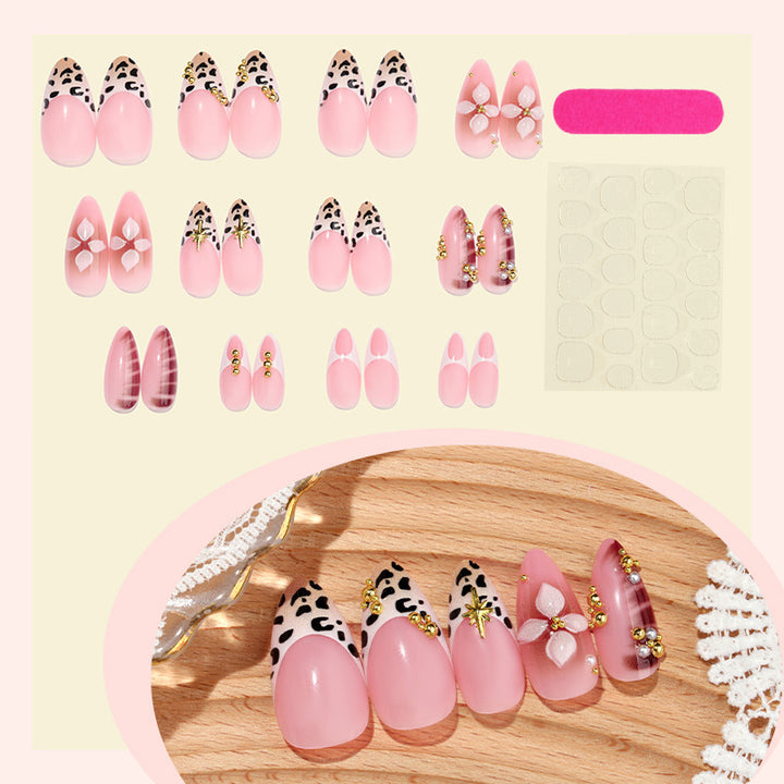 Acrylic nail set with glamorous accents and floral decorations Kalsten