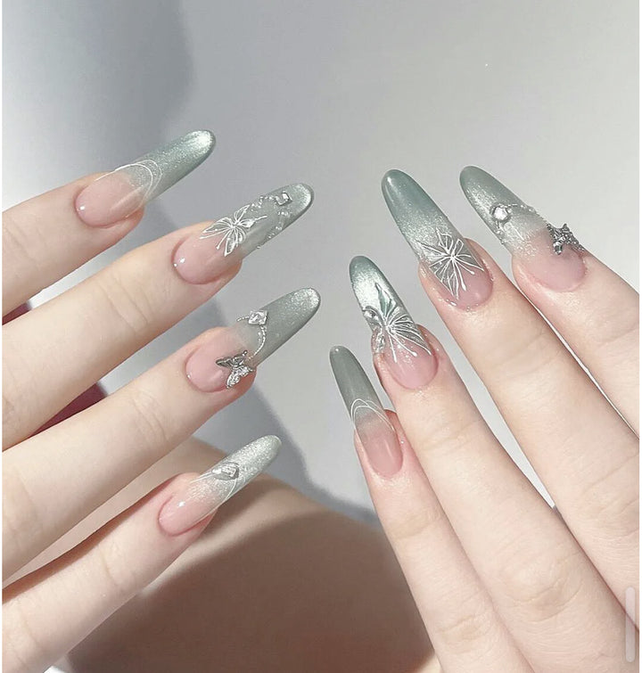 Artistic Press-On Nail Design with Floral Accents Kalsten