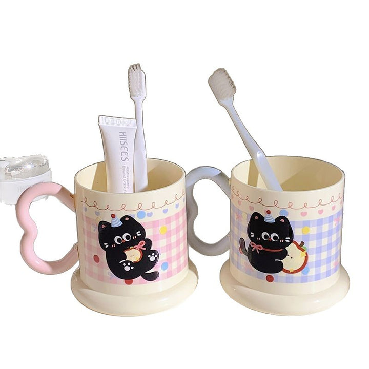 Ceramic mug with playful cat motif Kalsten