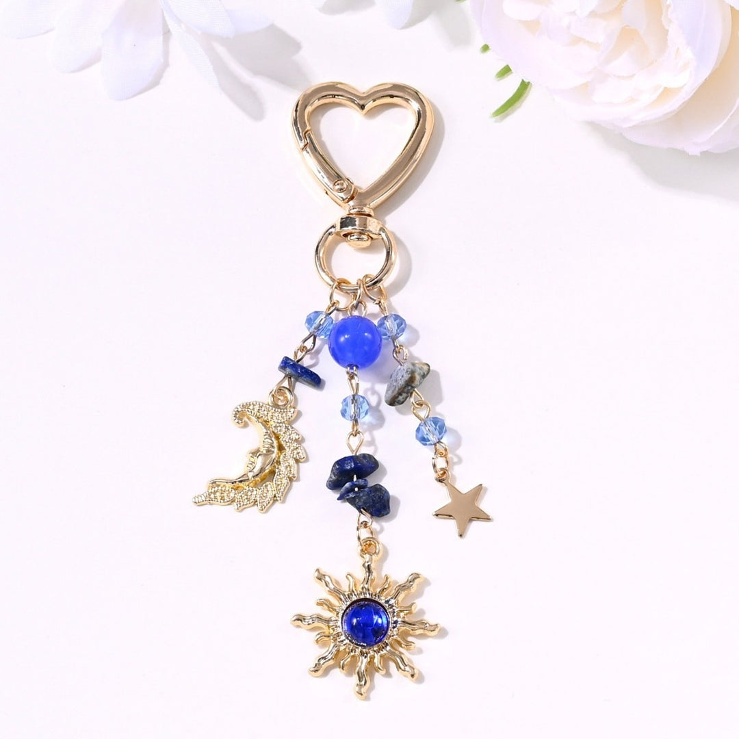 Keychain with Sparkling Sun Motif Kalsten