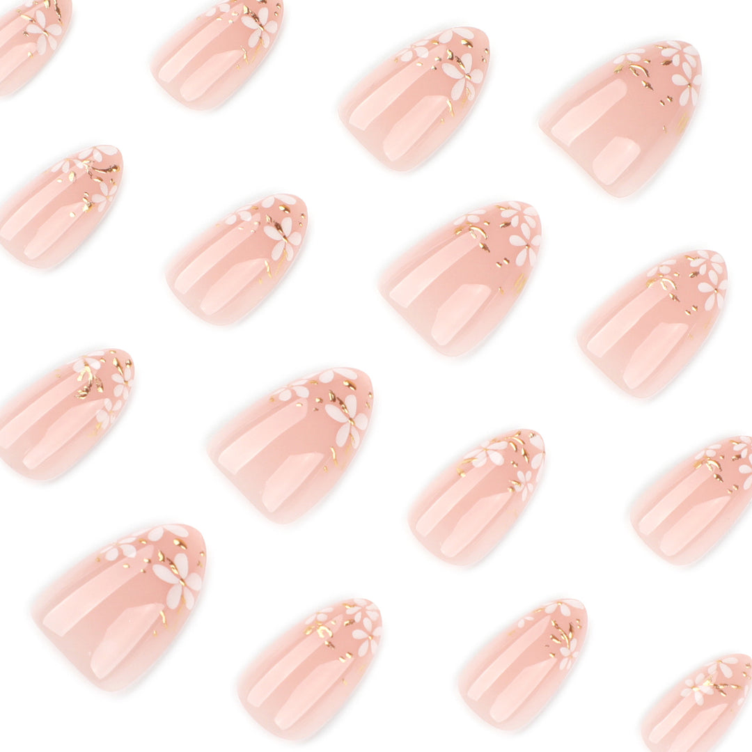 Artful nail art with floral design and glitter accents Kalsten