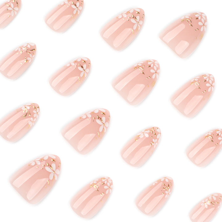 Artful nail art with floral design and glitter accents Kalsten