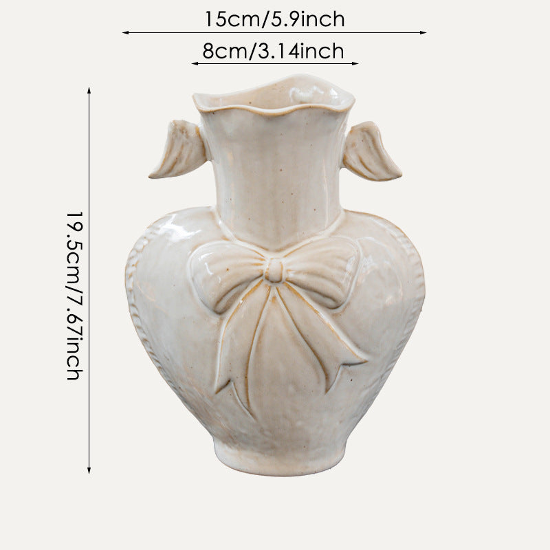 Decorative Heart-Shaped Ceramic Vase with Sculpted Bow and Wavy Neck