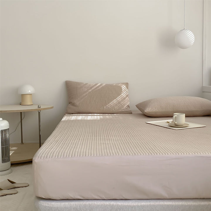 Quilted mattress topper fitted sheet with elastic all-around rubber