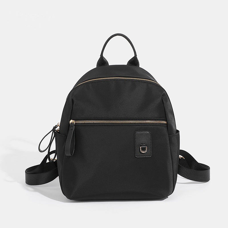 Compact Nylon Backpack with Multiple Pockets