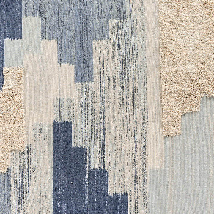 Modern structured living rug with partial shag application and abstract stripe pattern