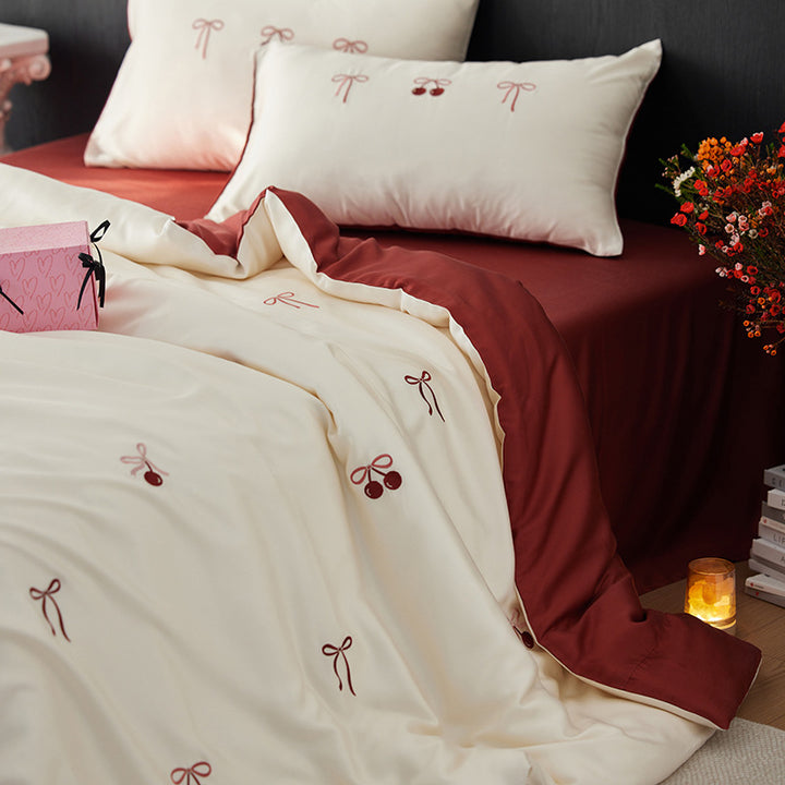 Luxurious cotton satin duvet cover set with embroidered butterfly designs and reversible design