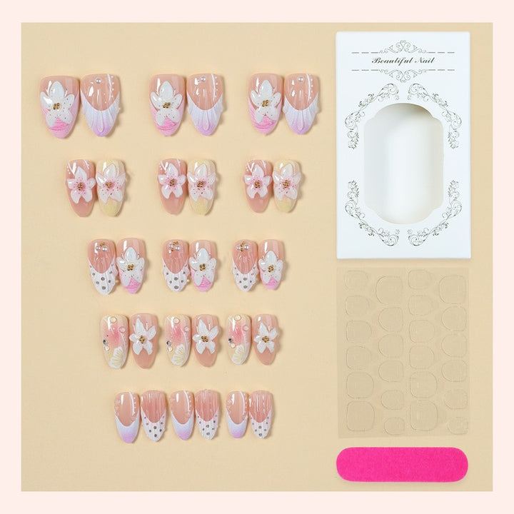 Nail art set with elegant floral design and glitter accents Kalsten