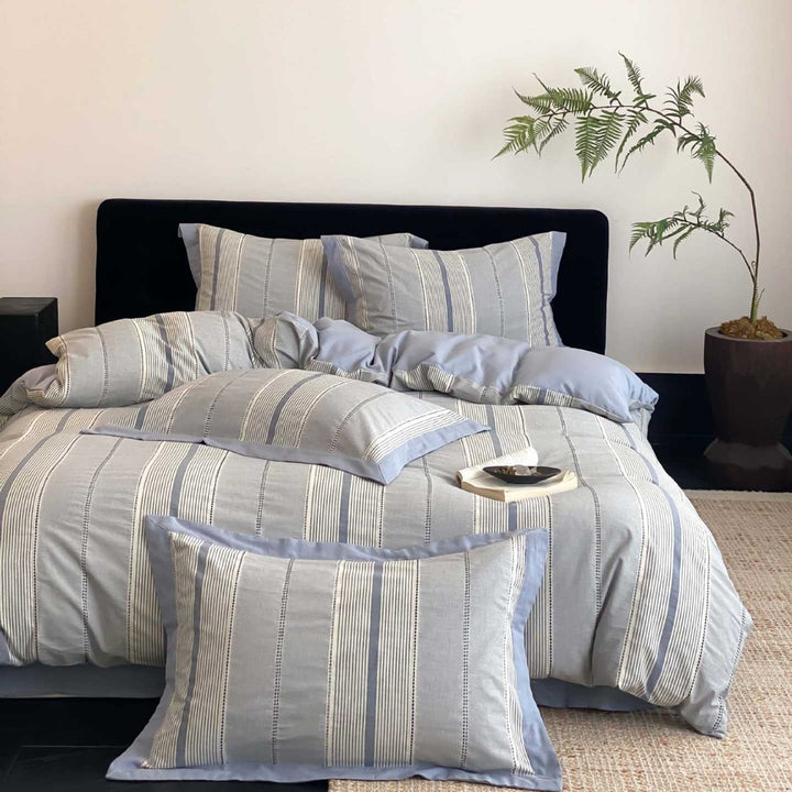 Luxurious linen-cotton bedding with fine stripes and pillowcases