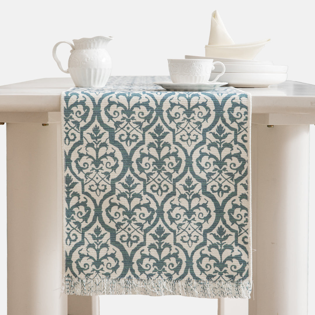 Jacquard table runner with floral vine structure and decorative fringes Kalsten