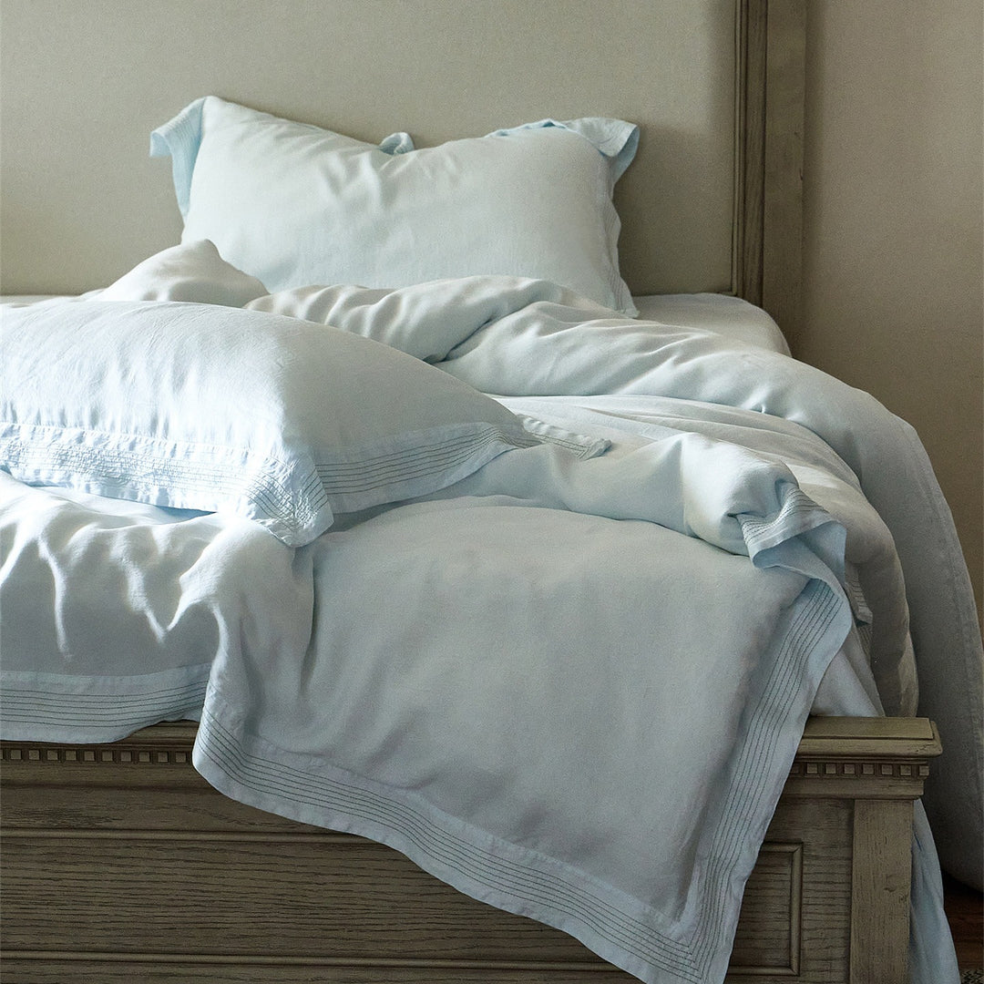 Luxury cotton bedding set with fine piping and elegant linen look