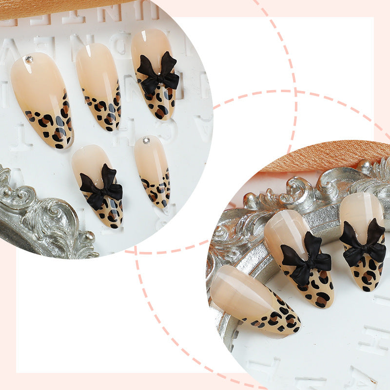 Artificial nail set with elegant leopard pattern and glamorous 3D elements Kalsten