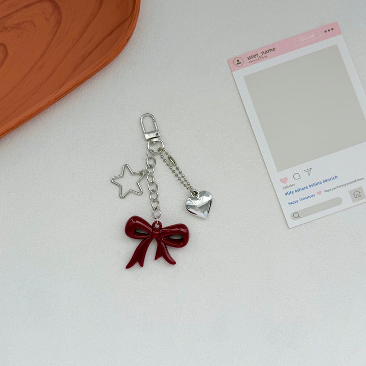 Playful Bow and Star Keychain Kalsten