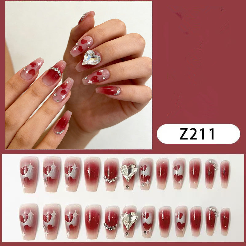 Artistic Press-On Nail Set with Heart and Gem Accents