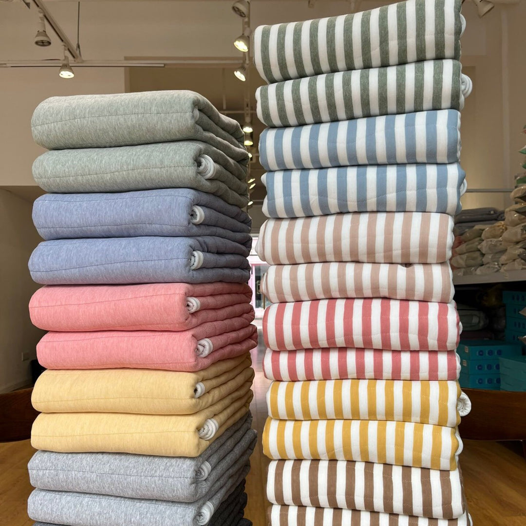 Quilted all-season duvet made of cotton blend fabric with fine cord texture