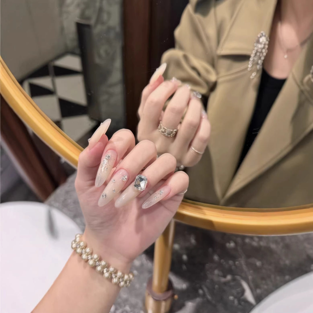 Rhinestone-Embellished Stiletto Nail Extensions