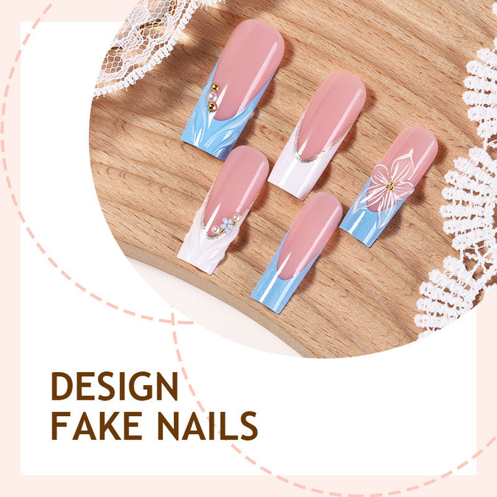 Nail set with elegant floral accents and glitter Kalsten