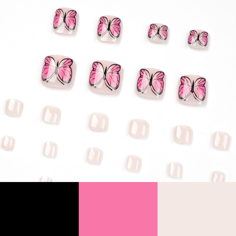Artful toenail design with butterfly design Kalsten