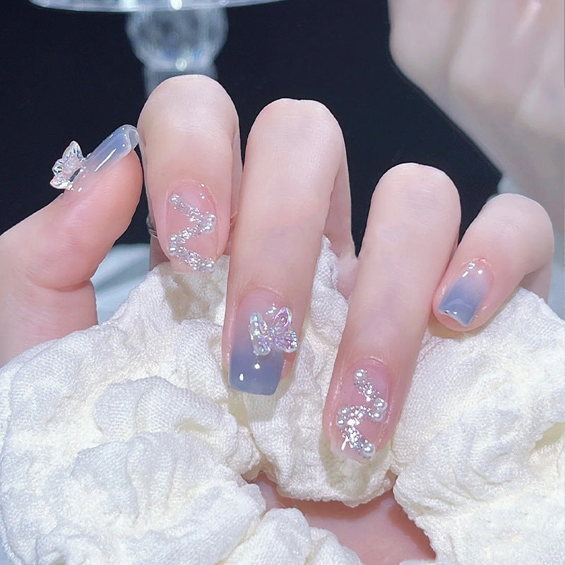 Acrylic nail set with sparkling glitter elements and appealing ombre design Kalsten