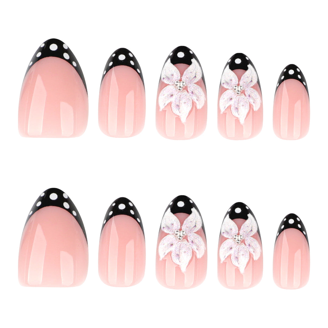 Artistic nail art with floral designs and elegant accents Kalsten