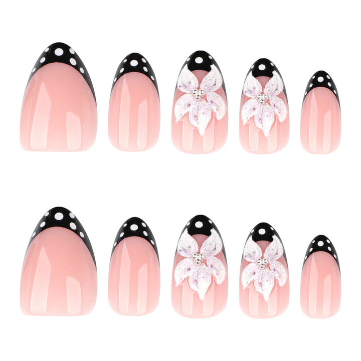 Artistic nail art with floral designs and elegant accents Kalsten