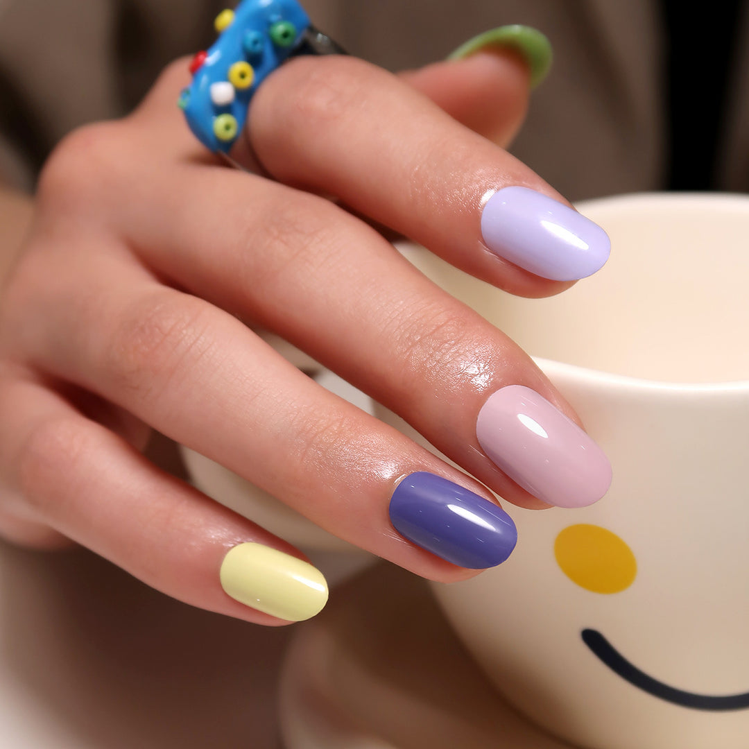 Artistic Nail Art with Soft Colors and High Gloss Finish Kalsten