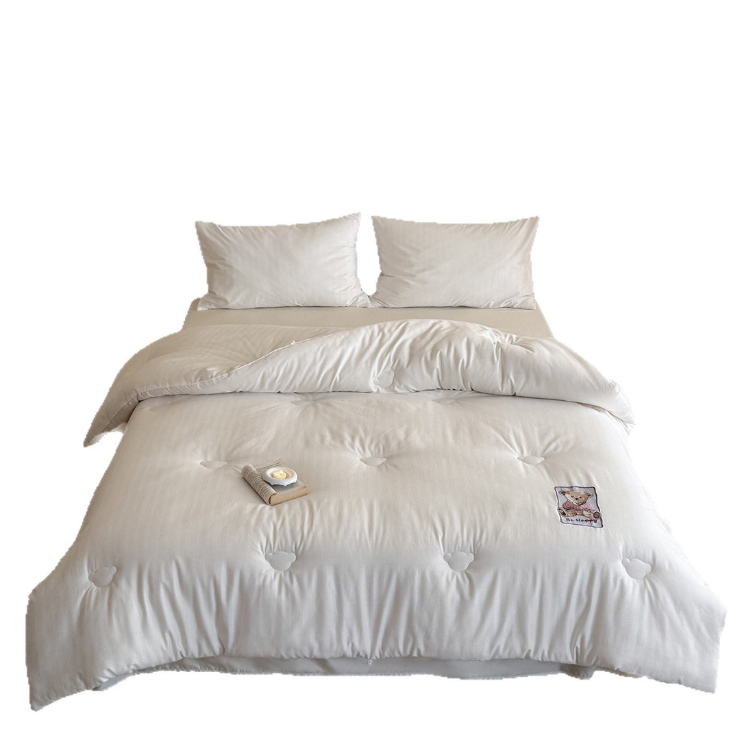 Quilted duvet with teddy applique and breathable microfiber filling