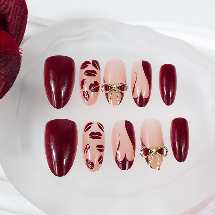 Artificial nail set with elegant bow and kiss mouth designs Kalsten